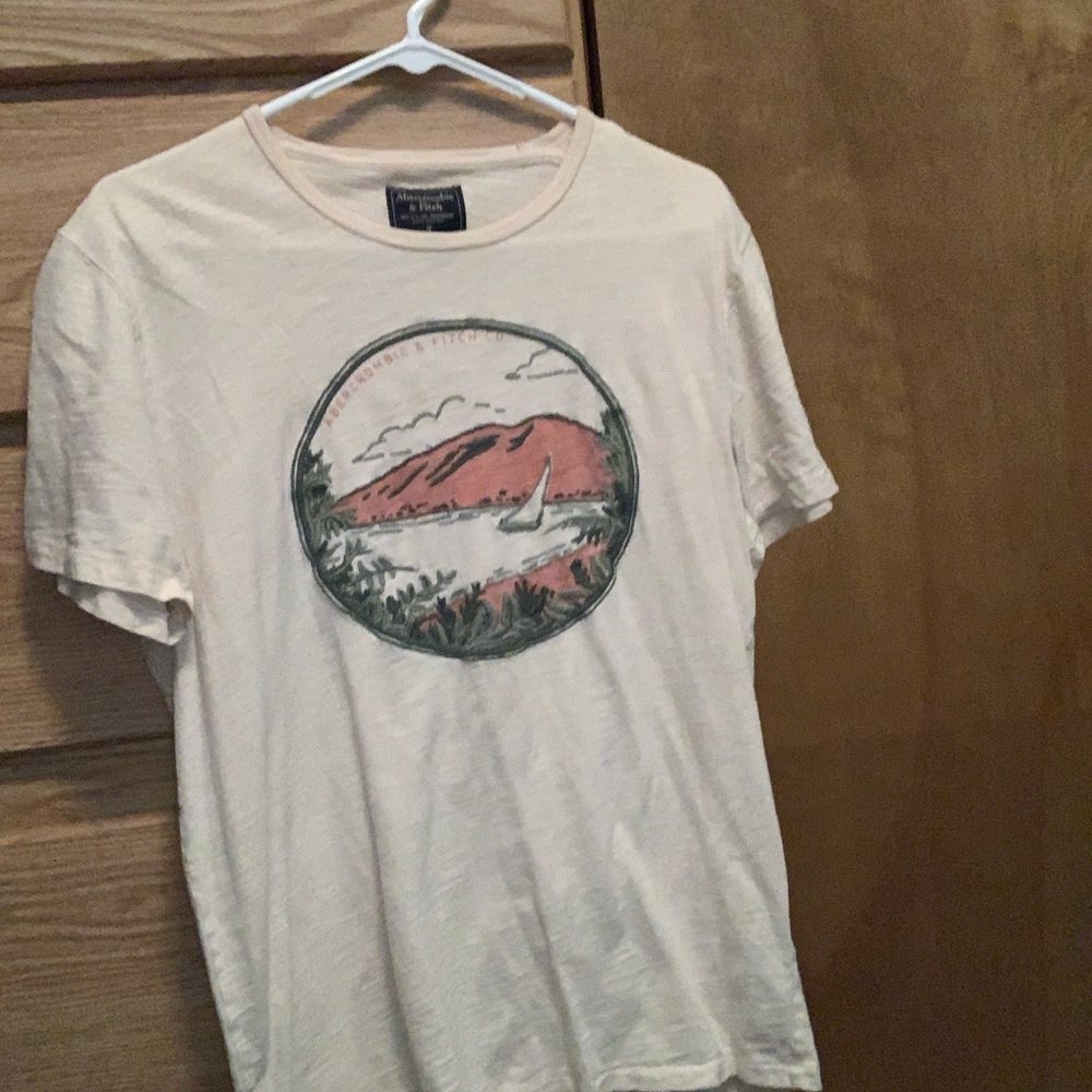 Graphic Cream Colored T Shirt.